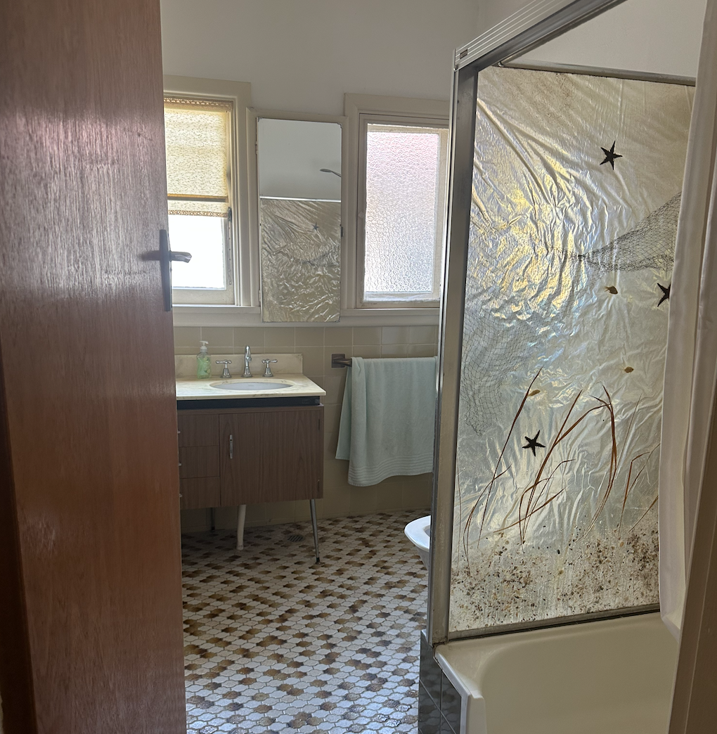 Before photo of an outdated bathroom before renovation by Fresher Bathrooms in Newtown.